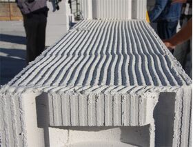 Mortier adhésif blanc pour béton cellulaire, application en couche mince